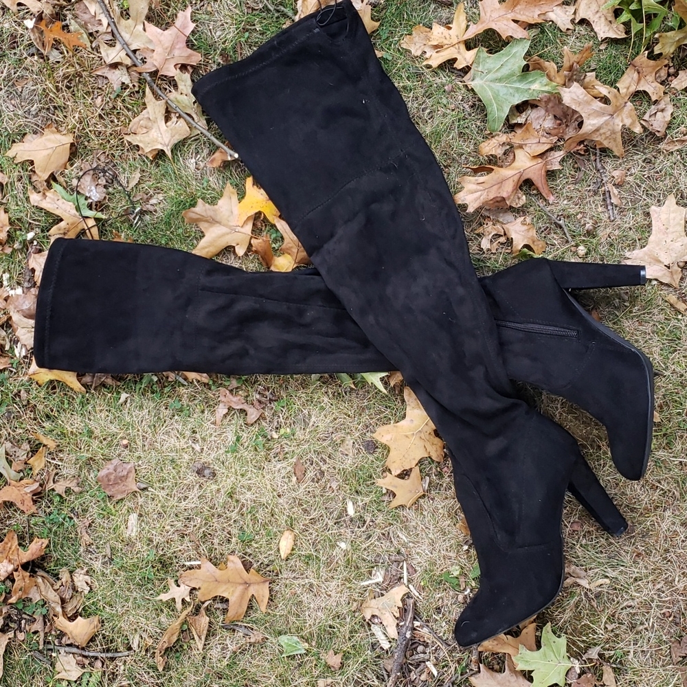 Black over the knee high heeled boots